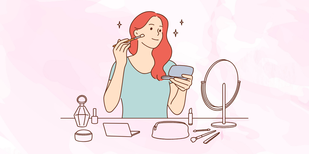 女性が楽しそうにメイクをしている様子。